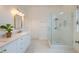 Bright bathroom with white cabinets, quartz countertops, and a glass-enclosed shower at 401 Felders Ln, Johns Island, SC 29455