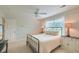 Comfortable bedroom with neutral colors, a ceiling fan, and lots of natural light at 401 Felders Ln, Johns Island, SC 29455