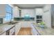 Bright kitchen featuring granite countertops, stainless appliances, and tile backsplash at 401 Felders Ln, Johns Island, SC 29455