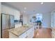 Island kitchen with stainless steel appliances and eat in breakfast nook at 401 Felders Ln, Johns Island, SC 29455