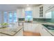 Bright kitchen with granite counters, modern appliances, and lots of natural light at 401 Felders Ln, Johns Island, SC 29455