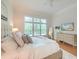 Serene main bedroom featuring a plush bed, stylish furnishings, and abundant natural light at 401 Felders Ln, Johns Island, SC 29455