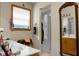 Bathroom with white sink and toilet and a wooden vanity and mirror at 427 Grape Arbor Drive Dr, Summerville, SC 29486