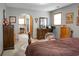 Bedroom with gray walls and trim, carpet, dark wood furniture and an arched doorway at 427 Grape Arbor Drive Dr, Summerville, SC 29486
