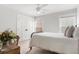 Comfortable bedroom featuring a four-poster bed and a window offering peaceful outdoor views at 428 Bluegill Ln, Johns Island, SC 29455
