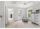 Bright, airy bedroom with a comfortable chair, white cabinet, and natural light at 428 Bluegill Ln, Johns Island, SC 29455