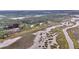 A stunning aerial view showcasing waterfront homes along the marsh with private boat docks at 4352 Park Island Rd, Hollywood, SC 29449