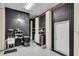 Functional basement with wood paneling, utility sink, and extra storage at 4352 Park Island Rd, Hollywood, SC 29449
