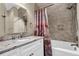 Bathroom featuring a marble countertop vanity and shower-tub combination at 4352 Park Island Rd, Hollywood, SC 29449
