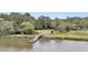 A wooden boat ramp offering peaceful water access and picturesque nature views at 4352 Park Island Rd, Hollywood, SC 29449