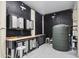 Organized garage space with workbench, cabinets, and epoxy floors for projects and storage solutions at 4352 Park Island Rd, Hollywood, SC 29449