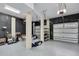 Spacious garage with epoxy floors and ample storage, perfect for parking and storing your belongings at 4352 Park Island Rd, Hollywood, SC 29449