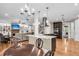 Open floor plan shows living room with fireplace adjacent to an island kitchen at 4352 Park Island Rd, Hollywood, SC 29449