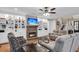 Cozy living room with a brick fireplace, built-in shelving, and comfortable seating at 4352 Park Island Rd, Hollywood, SC 29449