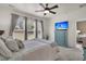 Bright bedroom with a comfortable bed and stylish blue dresser at 513 Sea Foam St, Summerville, SC 29486