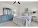 Serene bedroom with a comfortable bed and stylish blue dresser at 513 Sea Foam St, Summerville, SC 29486