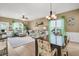 Bright open-concept living and dining area with neutral color scheme at 513 Sea Foam St, Summerville, SC 29486