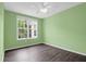 Bright bedroom with ample natural light and a ceiling fan, showcasing a comfortable living space at 60 Fenwick Hall Allee # 738, Johns Island, SC 29455