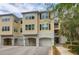 Charming multi-level home with attached garages, neutral paint, and an inviting walkway to the entrance at 60 Fenwick Hall Allee # 738, Johns Island, SC 29455