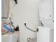 Efficient utility room with stacked washer and dryer, plus a water heater at 60 Fenwick Hall Allee # 738, Johns Island, SC 29455
