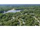 Wide aerial view of the residential community near the lake, showcasing the verdant surroundings and peaceful environment at 617 Deepwood Ct, Moncks Corner, SC 29461