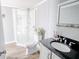 This bright bathroom features a glass enclosed shower, modern sink, and stylish accents at 617 Deepwood Ct, Moncks Corner, SC 29461