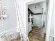 En-suite bathroom with step-in shower, and decorative hanging swing at 617 Deepwood Ct, Moncks Corner, SC 29461