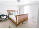 This bedroom features neutral carpeting, a bed with wood frame, and a comfortable layout at 617 Deepwood Ct, Moncks Corner, SC 29461