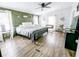Spacious bedroom featuring wood-look vinyl floors and bright natural light at 617 Deepwood Ct, Moncks Corner, SC 29461
