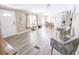 Bright, open living room with hardwood flooring, neutral paint, and plenty of natural light at 617 Deepwood Ct, Moncks Corner, SC 29461