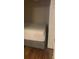 Compact bedroom featuring a bed and hardwood floors, suitable for a single occupant at 65 Vanderhorst St # C, Charleston, SC 29403