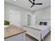 Bright bedroom with ceiling fan, neutral color scheme and natural light at 711 Blueway Ave, Summerville, SC 29486