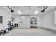 Spacious two-car garage with epoxy floors and ample storage at 711 Blueway Ave, Summerville, SC 29486