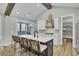 Contemporary kitchen featuring a large island with seating and modern appliances at 711 Blueway Ave, Summerville, SC 29486