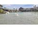 Sparkling pool featuring fountains and beach umbrellas, with crystal clear water for a refreshing swim at 711 Blueway Ave, Summerville, SC 29486