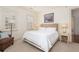 Bright bedroom with white walls, plantation shutters, and neutral decor exudes a calming atmosphere at 74 Hospitality St, Mount Pleasant, SC 29464