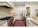 Spacious kitchen with granite countertops, stainless steel appliances, and custom cabinetry at 74 Hospitality St, Mount Pleasant, SC 29464