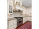 Close up shot of spacious kitchen with granite countertops, stainless steel appliances, and custom cabinetry at 74 Hospitality St, Mount Pleasant, SC 29464
