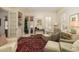 Inviting living room with fireplace and French doors, blending comfort and style at 74 Hospitality St, Mount Pleasant, SC 29464