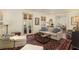 Comfortable living room featuring stylish seating, French doors, and hardwood floors at 74 Hospitality St, Mount Pleasant, SC 29464