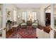 Cozy living room features hardwood floors, neutral furniture, and bright natural light at 74 Hospitality St, Mount Pleasant, SC 29464