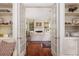 Open living room showcasing built-in shelving and hardwood flooring at 74 Hospitality St, Mount Pleasant, SC 29464