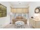 Cozy sitting room with bay window, comfortable seating, and light, neutral tones at 74 Hospitality St, Mount Pleasant, SC 29464