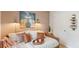 Well-decorated secondary bedroom featuring a daybed with unique lighting and decor at 8030 Rackham Rd, Hollywood, SC 29470