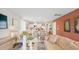 Open-concept living space featuring a comfortable sofa, stylish decor, and seamless flow to the kitchen at 8030 Rackham Rd, Hollywood, SC 29470