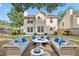 Spacious backyard with patio furniture and a lush lawn, great for outdoor entertaining at 8340 Coventry Ct, North Charleston, SC 29420