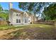 Spacious backyard featuring a lawn, fence, and patio, perfect for outdoor enjoyment and entertaining at 8340 Coventry Ct, North Charleston, SC 29420