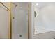 Modern bath with a glass shower, gold trim, and soaking tub perfect for rejuvenation at 8340 Coventry Ct, North Charleston, SC 29420
