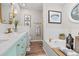 Beautifully renovated bathroom with stylish vanity, fixtures, and a soaking tub for relaxation at 8340 Coventry Ct, North Charleston, SC 29420