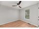 Bright bedroom with a ceiling fan, wood-look floors, and a window at 8340 Coventry Ct, North Charleston, SC 29420